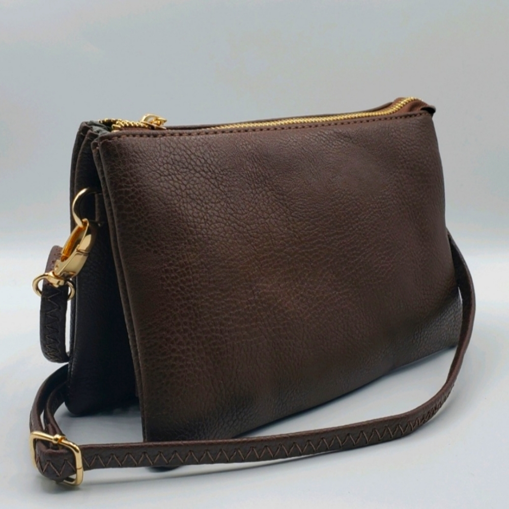 Genuine leather crossbody bag.